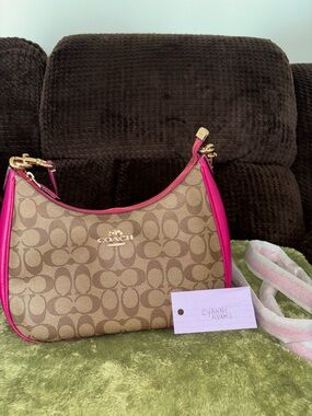 Coach Teri Hobo Bag in Signature Canvas with Pink Leather Trim